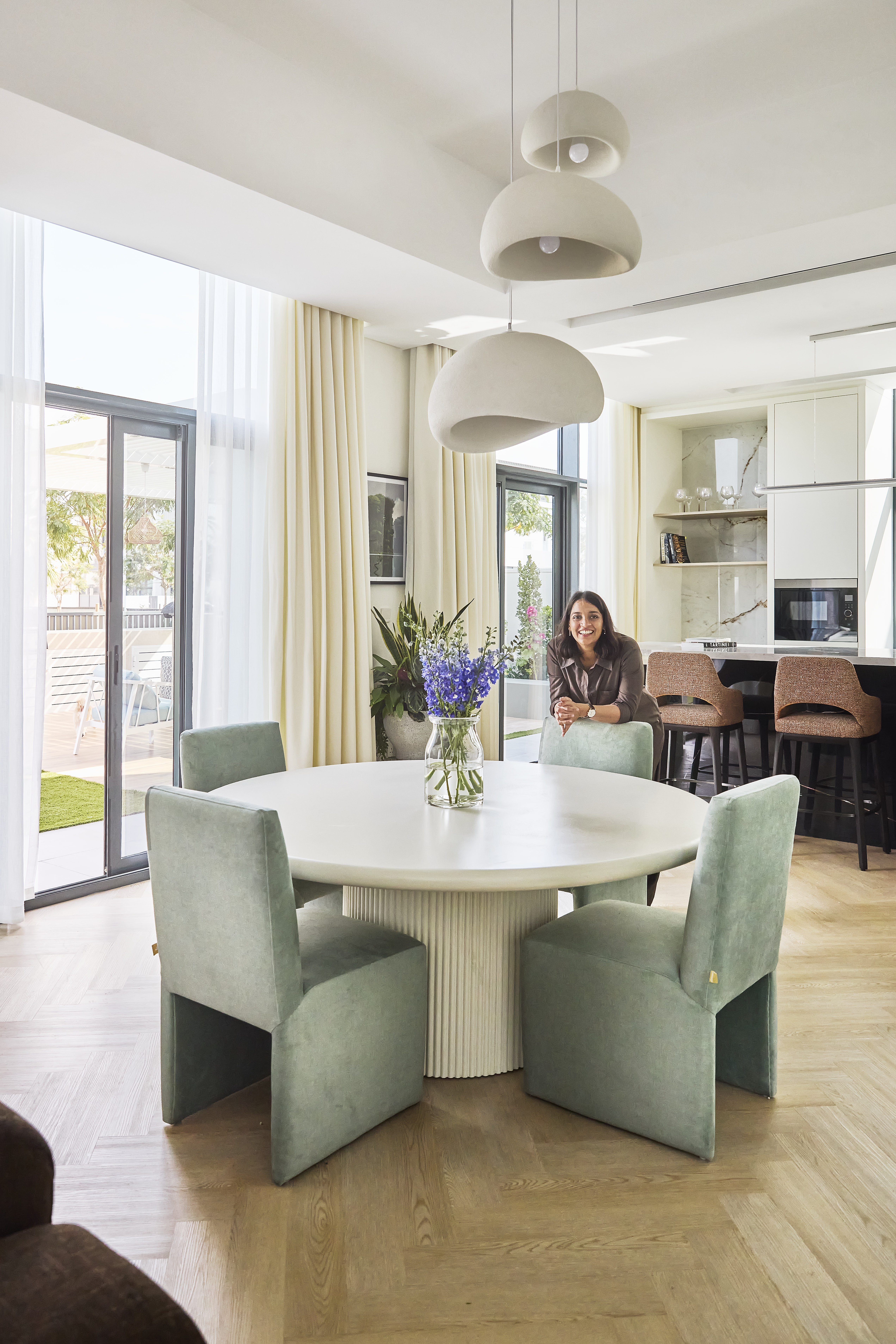 Dining area with custom furniture in a villa in dubai designed by 24west studio